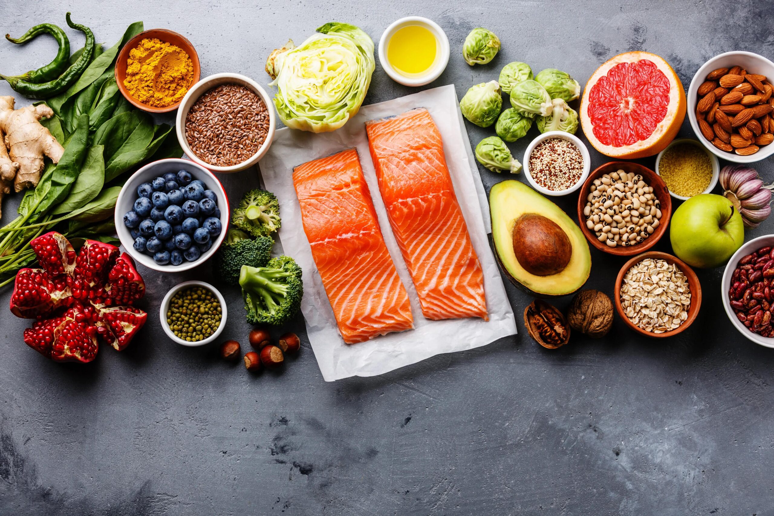 Healthy meal with salmon, berries and leafy greens for brain health